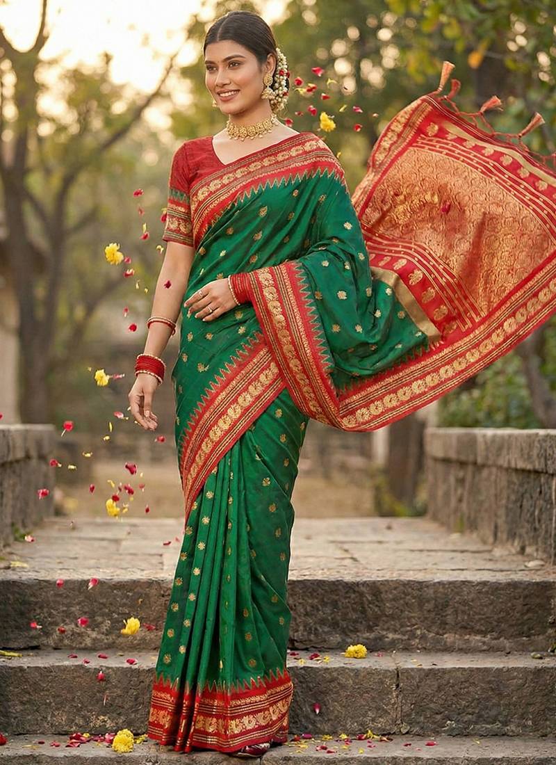 Dark green banarasi silk blend saree with red zari border