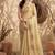 Beige gold linen silk blend saree with gold zari bootas