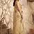 Beige gold linen silk blend saree with gold zari bootas