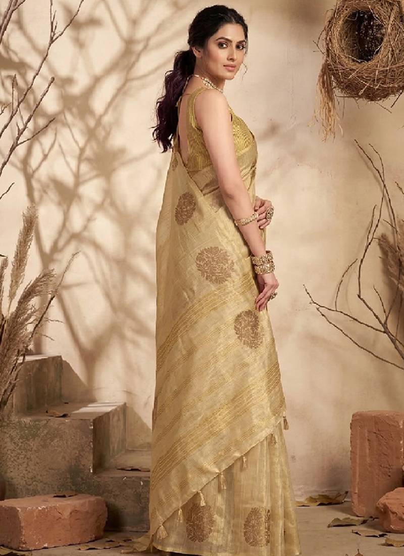 Beige gold linen silk blend saree with gold zari bootas