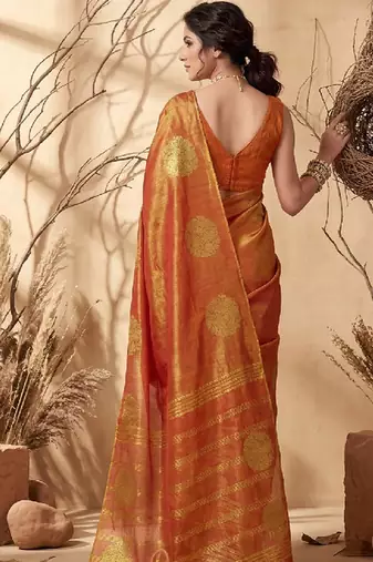 Rust orange linen silk blend saree with gold zari bootas