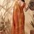 Rust orange linen silk blend saree with gold zari bootas