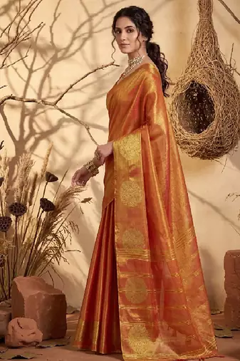 Rust orange linen silk blend saree with gold zari bootas