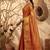Rust orange linen silk blend saree with gold zari bootas