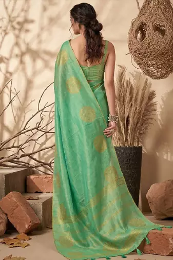 Sea green linen silk blend saree with gold zari bootas