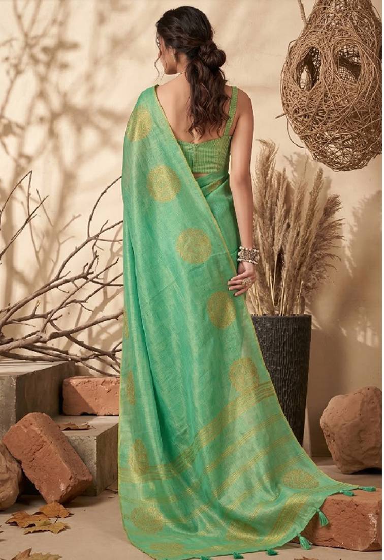 Sea green linen silk blend saree with gold zari bootas