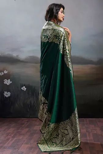 Dark green banarasi silk blend saree with rich gold zari weaving