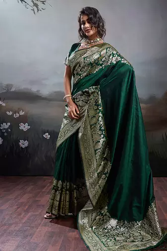 Dark green banarasi silk blend saree with rich gold zari weaving