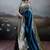 Teal blue banarasi silk blend saree with rich gold zari weaving