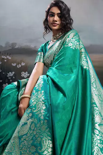 Turquoise banarasi silk blend saree with rich gold zari weaving