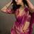 Onion pink linen silk blend saree with gold zari bootas and tassels