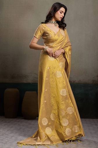 Gold linen silk blend saree with gold zari bootas and tassels