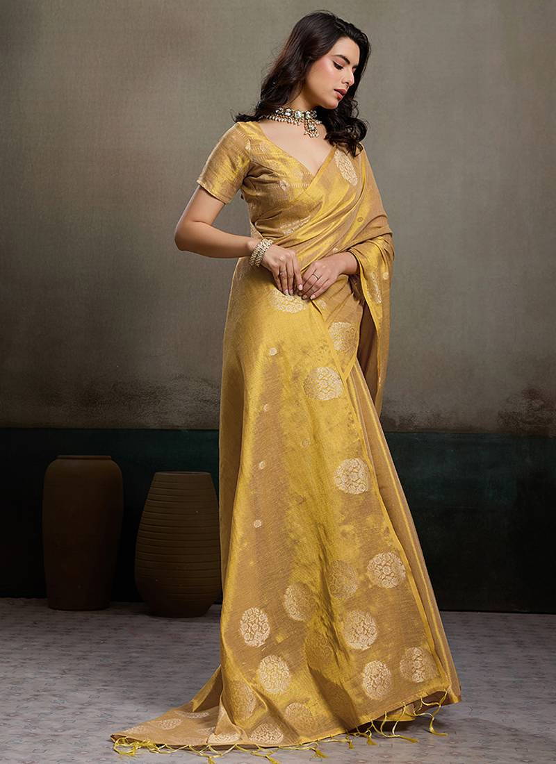 Gold linen silk blend saree with gold zari bootas and tassels