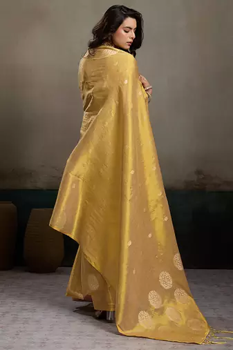Gold linen silk blend saree with gold zari bootas and tassels