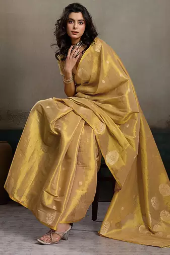 Gold linen silk blend saree with gold zari bootas and tassels