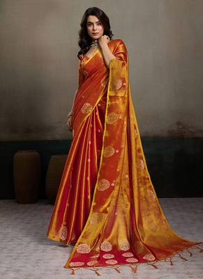 Rust orange linen silk blend saree with gold zari bootas and tassels 1