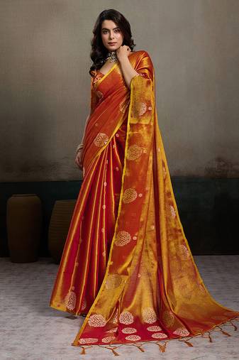 Rust orange linen silk blend saree with gold zari bootas and tassels