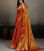 Rust orange linen silk blend saree with gold zari bootas and tassels