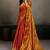Rust orange linen silk blend saree with gold zari bootas and tassels
