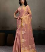 Light peach linen silk blend saree with gold zari bootas and tassels