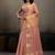 Light peach linen silk blend saree with gold zari bootas and tassels