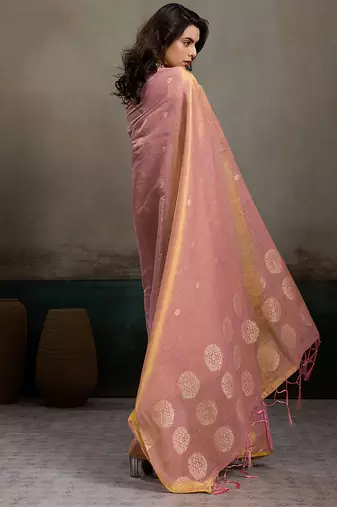 Light peach linen silk blend saree with gold zari bootas and tassels