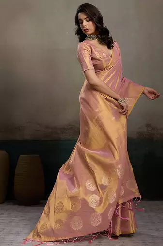 Light peach linen silk blend saree with gold zari bootas and tassels