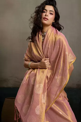 Light peach linen silk blend saree with gold zari bootas and tassels