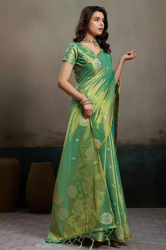 Sea green linen silk blend saree with gold zari bootas and tassels
