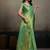 Sea green linen silk blend saree with gold zari bootas and tassels