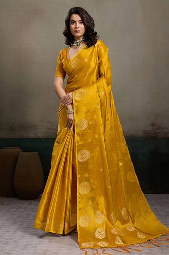 Mustard yellow linen silk blend saree with gold zari bootas and tassels