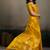 Mustard yellow linen silk blend saree with gold zari bootas and tassels