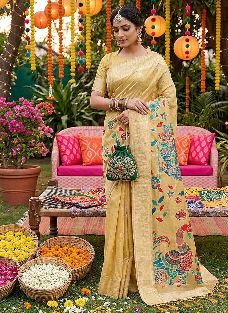 Light yellow banarasi silk blend saree with multicolor meenakari peacock weaving