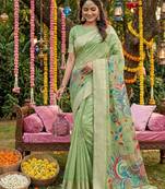 Mint green banarasi silk blend saree with multicolor meenakari peacock weaving
