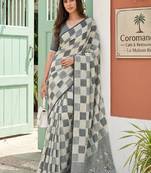 Off white linen cotton blend saree with geometric checkered patterns