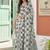 Off white linen cotton blend saree with geometric checkered patterns