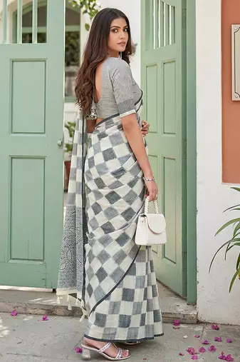 Off white linen cotton blend saree with geometric checkered patterns