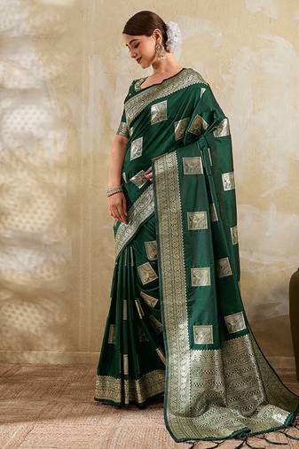 Dark green zari woven banarasi silk blend saree with blouse piece