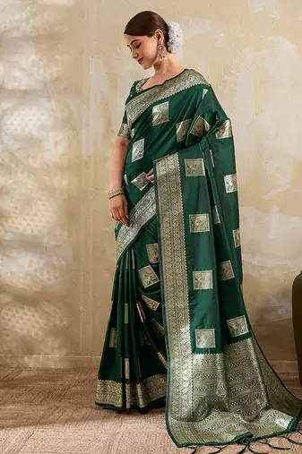 Dark green zari woven banarasi silk blend saree with blouse piece