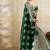 Dark green zari woven banarasi silk blend saree with blouse piece