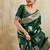 Dark green zari woven banarasi silk blend saree with blouse piece
