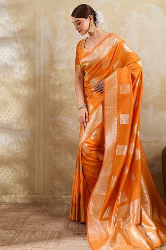 Orange zari woven banarasi silk blend saree with blouse piece