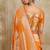 Orange zari woven banarasi silk blend saree with blouse piece