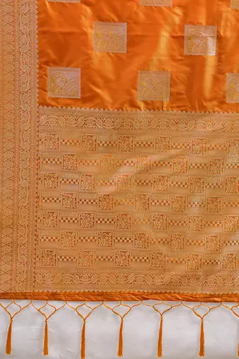 Orange zari woven banarasi silk blend saree with blouse piece