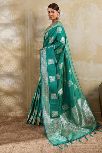 Teal zari woven banarasi silk blend saree with blouse piece