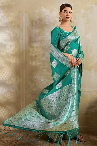 Teal zari woven banarasi silk blend saree with blouse piece