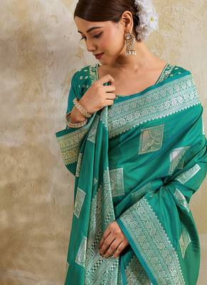 Teal zari woven banarasi silk blend saree with blouse piece 4