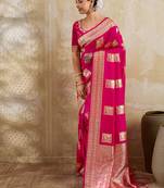 Rani pink zari woven banarasi silk blend saree with blouse piece