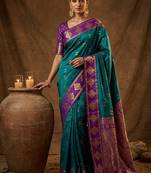 Teal blue zari woven banarasi silk blend saree with blouse piece
