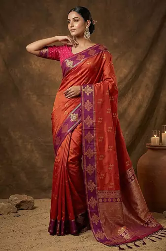 Rust orange  zari woven banarasi silk blend saree with blouse piece
